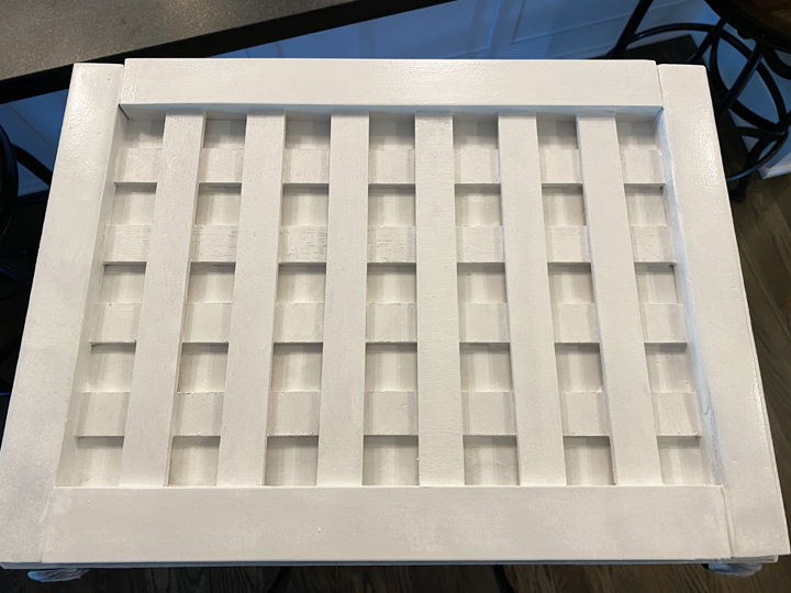 Mudroom Shoe Storage - white painted lattice trim